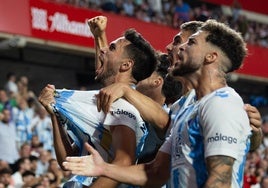 Nelson celebra un gol en Granada la pasada campaña, junto a Lobete, Chupete y Dani Sánchez.