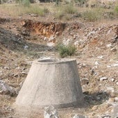 The rainwater tank where the bag with the skull was found.
